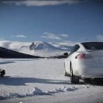 Tesla P85D races snowmobile over ice