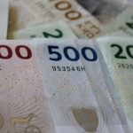Denmark raises repo rate to defend euro peg