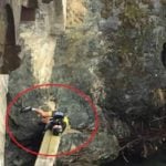 VIDEO: Cyclist survives 12-metre fall into lake
