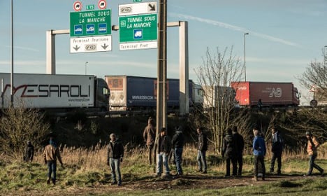 Migrants armed with sticks hold up truck driver in Calais