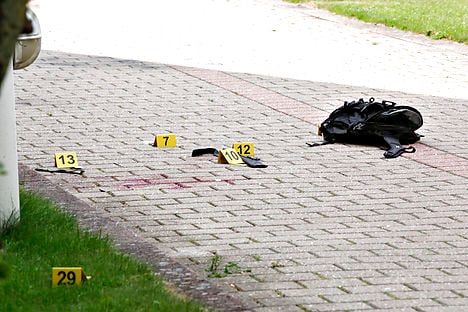 Police evidence at the location where the man was shot by officers. Photo: Uffe Weng/Scanpix