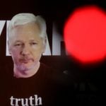 Ecuador prosecutor: Assange interrogation postponed