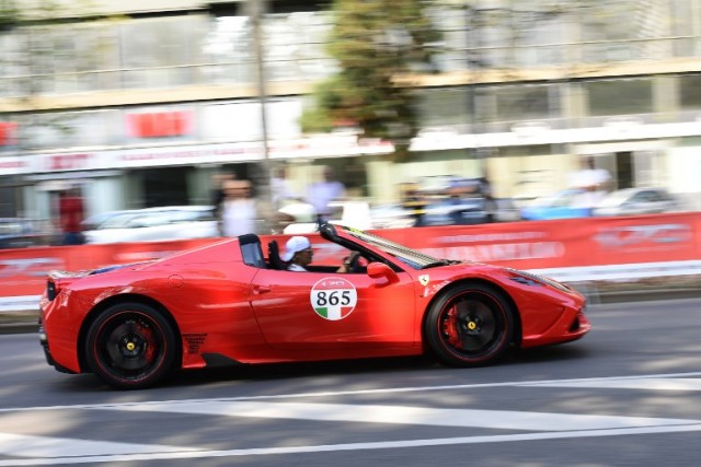 An Italian Ferrari model car arrives on September 8, 2017 at the Corso Sempione in Milano as it makes its way to Maranello, the home of Ferrari, for a meeting of 500 vehicles to celebrate Ferrari's 70th anniversary.  MIGUEL MEDINA / AFP