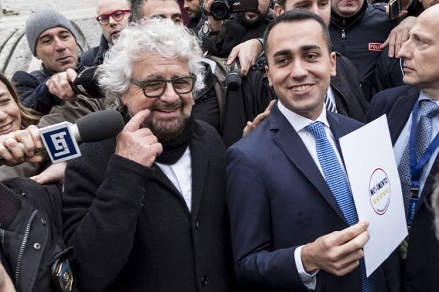 Beppe Grillo (L) with the party's former leader Luigi Di Maio. 