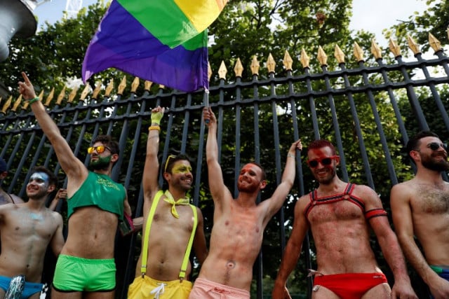Participants attend the Gay Pride parade in Paris on Sunday. Photo: GEOFFROY VAN DER HASSELT / AFP