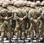 Video: Swiss soldiers ordered to throw stones and nuts at colleague