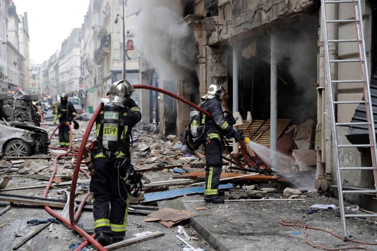 LATEST: Two firefighters killed in huge blast at central Paris bakery 