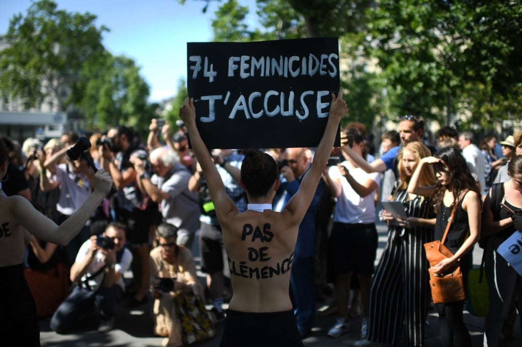France to step up action against domestic violence as hundreds take to the streets