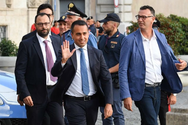 Italy coalition talks back on despite migration sore point