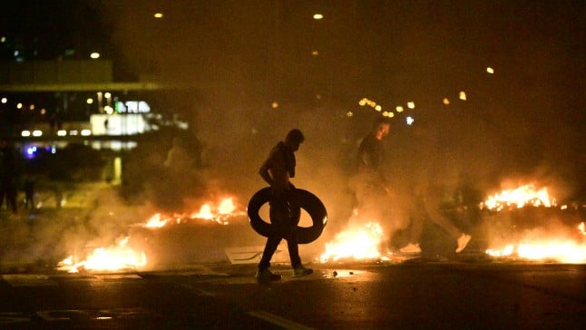 Riots erupt in Malmö after far-right activists burn Koran