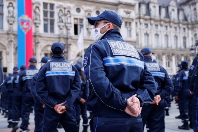 Municipal police officers attend their official presentation ceremony  in front of Paris City Hall.