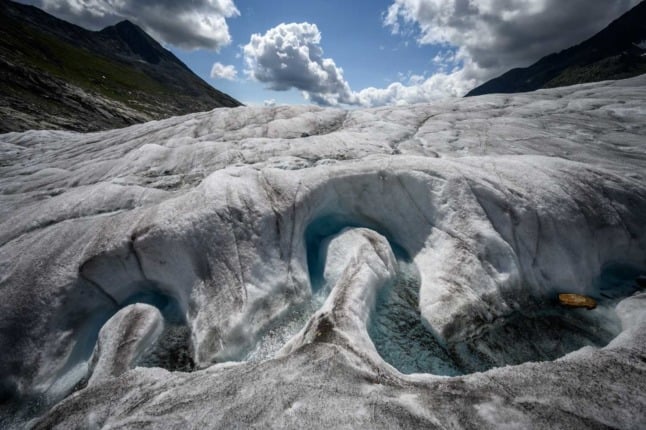 This file photograph taken on August 25, 2021, shows a view of the Aletsch Glacier. Swiss glaciers lost 1percent of their volume in 2021 despite abundant snow and a cool summer, due to climate change, the Swiss Academy of Natural Sciences revealed