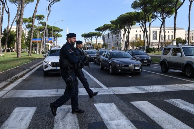 Carabinieri police officers on patrol near the 'Nuvola' congress centre in Rome's EUR district ahead of the G20 World Leaders Summit.