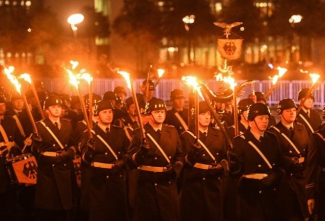 EXPLAINED: Why is German Twitter up in arms over a torch-light military parade?
