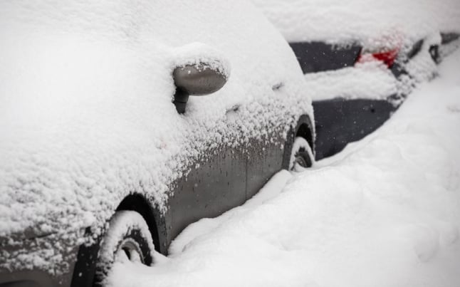 File photo of a car covered in snow in Norway, March 2021
