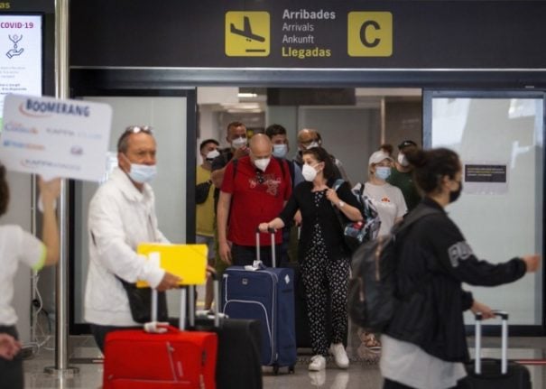 Tourists arrive at Son Sant Joan airport in Palma de Mallorca 