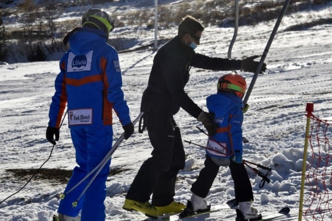 Child mounts a ski lift. New Covid rules in France make it complicated to visit the country for a skiing holiday with young children.