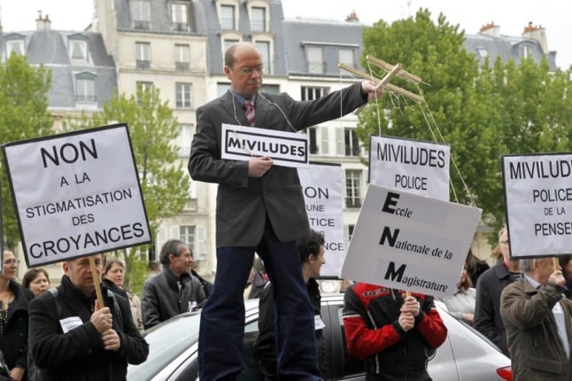 Scientologists in Paris protest against Miviludes - a French state-backed organisation set up to monitor and fight against cults. 