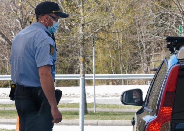 Pictured is a Norwegian police officer at the Svinesund border crossing. 
