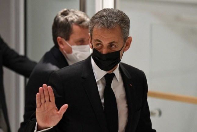 Nicolas Sarkozy leaves a Paris court