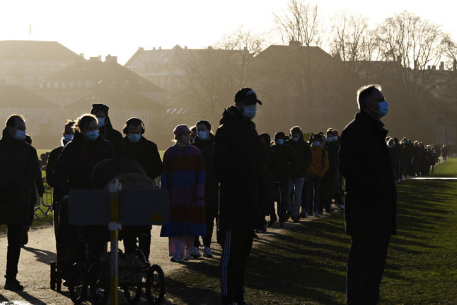 People queue for Covid-19 tests in Copenhagen in December 2021. 18 deaths related to the Omicron variant occurred in the country up to December 28th.
