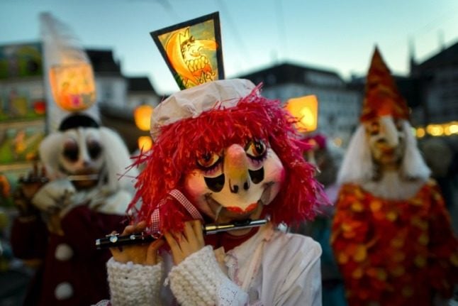 Will Basel’s traditional Fasnacht procession be postponed until June? Photo by FABRICE COFFRINI / AFP